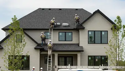 Professional roof and vinyl siding installation in Kansas City, MO home exterior upgrade