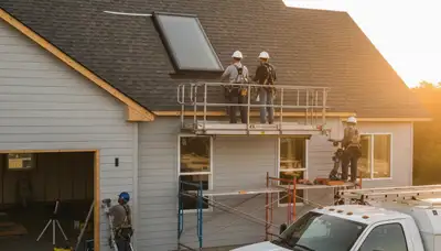 Professional skylight installation on vinyl siding home in Kansas City, MO by Next Level Exteriors
